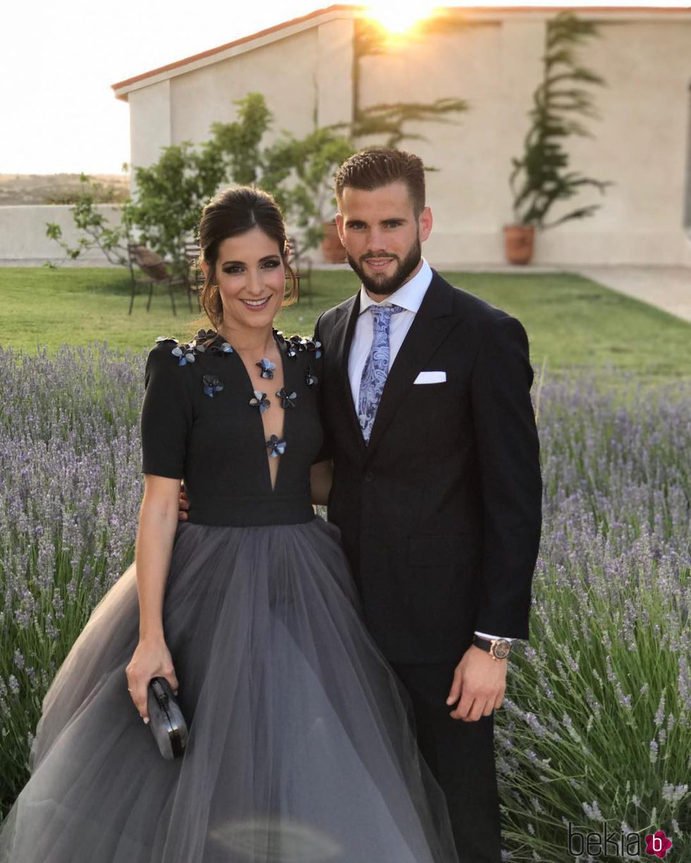 Nacho Fernández y María Cortes en la boda de Lucas Vázquez