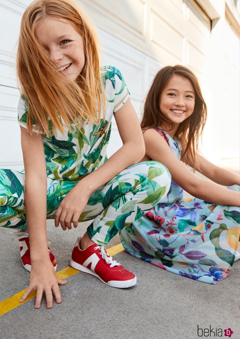 Mono y vestido con estampados florales de una colección exclusiva de H&M con dos diseñadores graficos