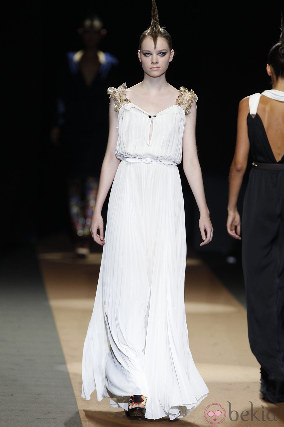 Vestido plisado de Miguel Palacio, colección primavera de 2012